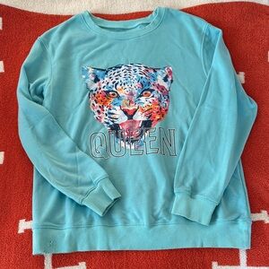 Blue Sweatshirt with Colorful Leopard Design
